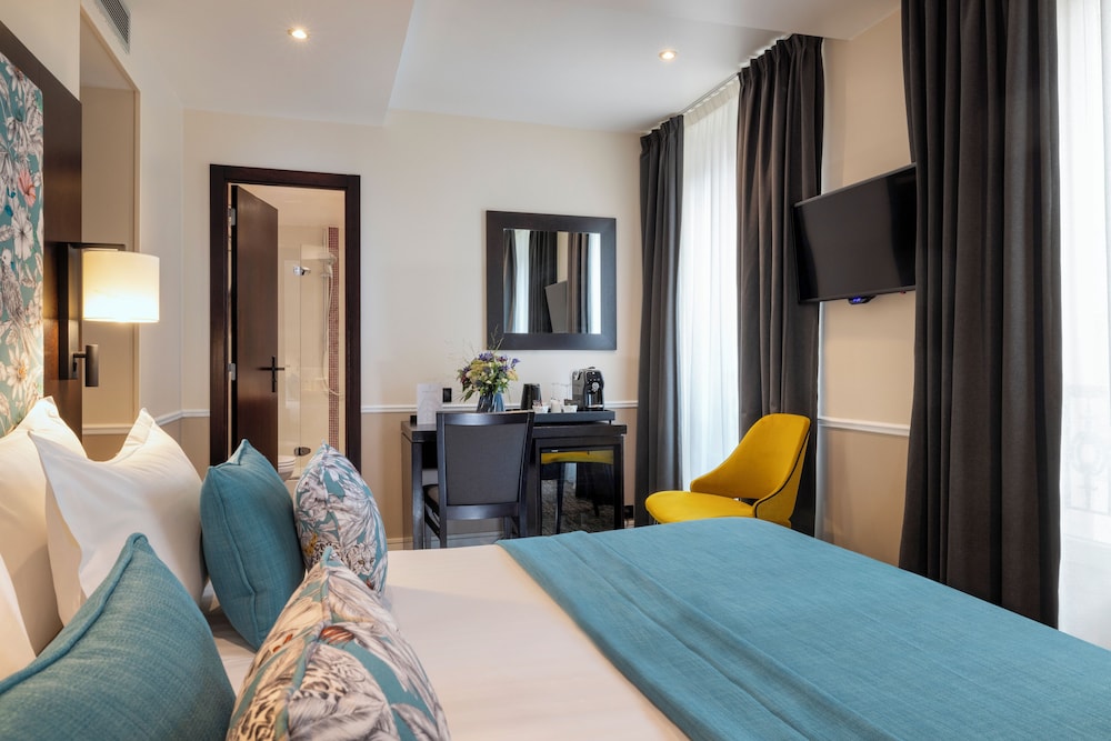 Habitación superior con 2 camas individuales del hotel Park Lane Paris. Foto 6