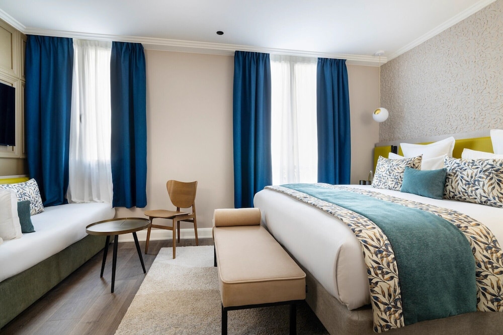 Habitación triple Deluxe del hotel L'Ormaie & Spa