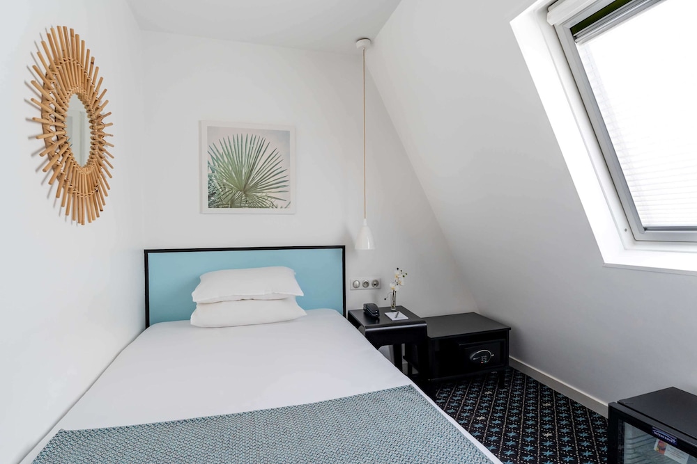 Habitación Individual - Minibar soft de cortesía, Chromecast, Prensa digital del hotel Palm - Astotel. Foto 1