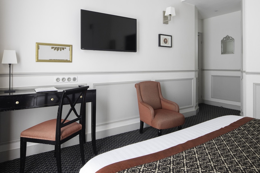 Habitación Doble - Minibar soft de cortesía, tés y cafés gratis,Chromecast,Prensa digital del hotel Bradford Elysées. Foto 1