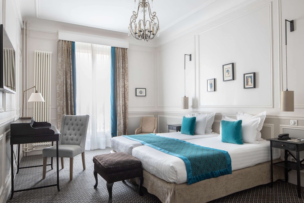 Privilegio con camas gemelas - Minibar soft de cortesía, cafés gratis, Chromecast, Prensa digital del hotel Bradford Elysées