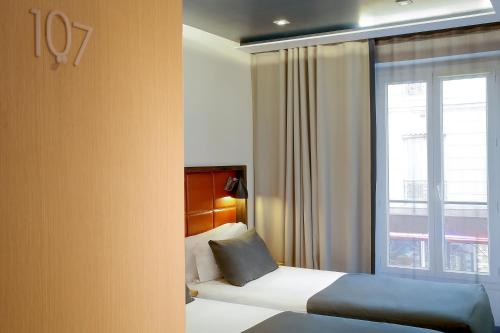 Habitación Doble Clásica - 2 camas del hotel Hotel Aulivia Opera. Foto 1