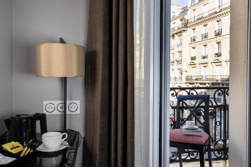 Habitación Doble con balcón - 1 o 2 camas del hotel Pavillon Monceau. Foto 4