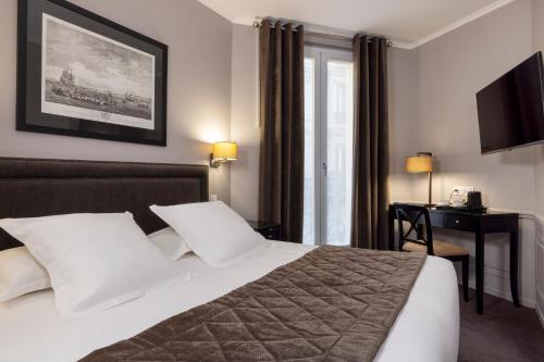 Habitación Doble Deluxe con balcón - 1 o 2 camas del hotel Pavillon Monceau. Foto 3