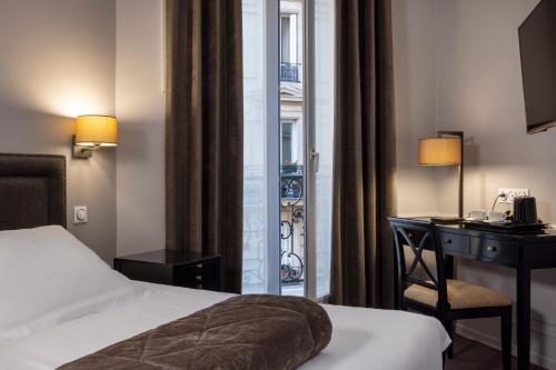 Habitación Doble Deluxe con balcón - 1 o 2 camas del hotel Pavillon Monceau. Foto 4