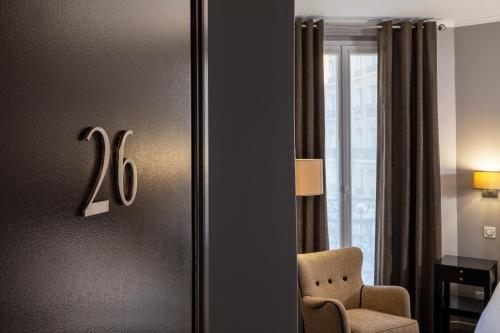 Habitación Doble Deluxe con balcón - 1 o 2 camas del hotel Pavillon Monceau. Foto 8