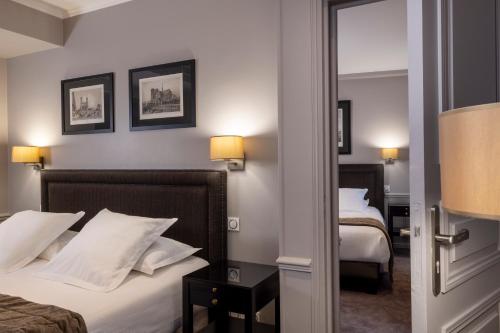 Habitación Familiar Superior del hotel Pavillon Monceau. Foto 4