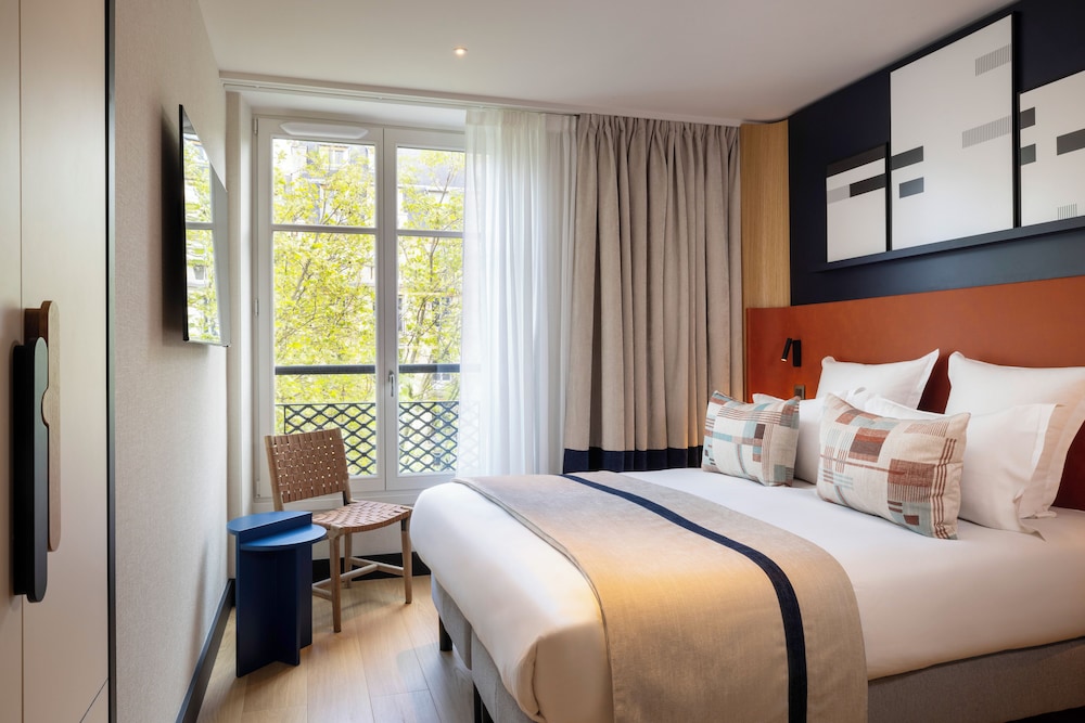 Habitación Clásica del hotel Raspail Montparnasse. Foto 1