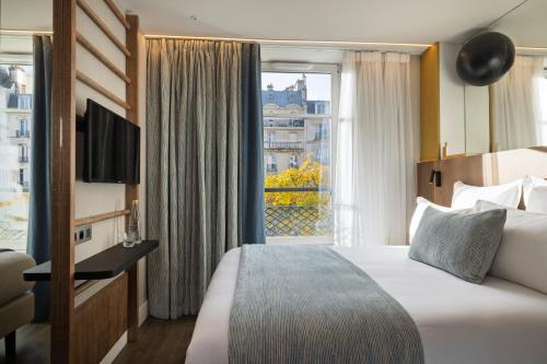 Habitación Individual Clásica del hotel Raspail Montparnasse. Foto 2