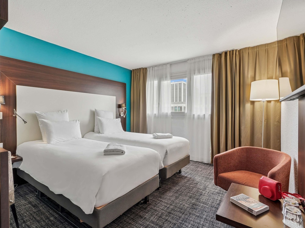 Habitación Clásica con camas individuales del hotel Mercure Paris Porte D'orléans