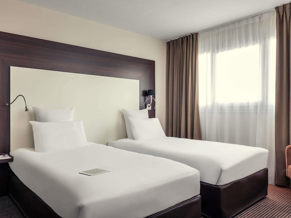 Habitación Privilege con camas individuales del hotel Mercure Paris Porte D'orléans