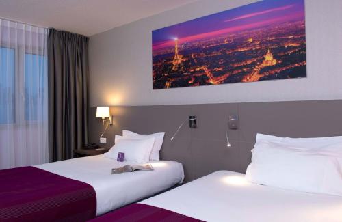 Habitación Doble Clásica con dos camas del hotel Mercure Paris 19 Philharmonie La Villette. Foto 5