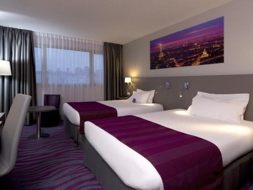 Habitación Doble Clásica con 2 camas dobles del hotel Mercure Paris 19 Philharmonie La Villette