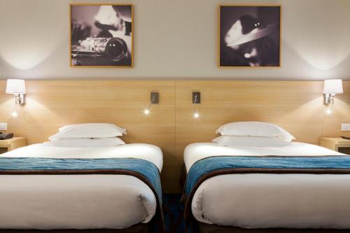 Habitación Doble Clásica con 2 camas dobles del hotel Mercure Paris 19 Philharmonie La Villette. Foto 3