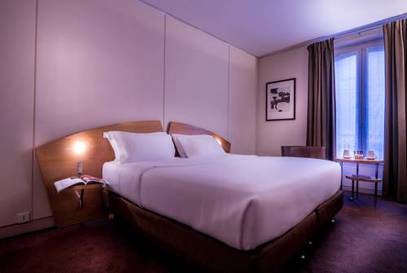 Habitación Doble Superior del hotel Le Pergolese Paris Champs Elysées. Foto 1