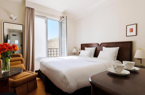 Habitación Doble Clásica del hotel Rochechouart - Orso Hotels. Foto 2