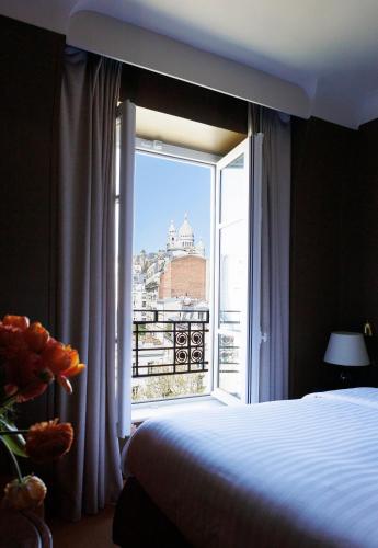 Habitación Clásica con Vista al Sacré - Cœur del hotel Rochechouart - Orso Hotels