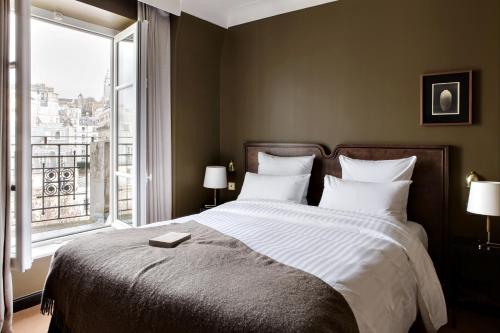 Habitación Clásica con Vista al Sacré - Cœur del hotel Rochechouart - Orso Hotels. Foto 4