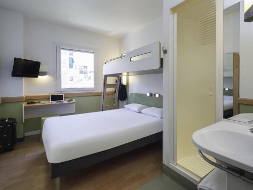 Habitación Doble con cama individual del hotel Ibis Budget Málaga Centro