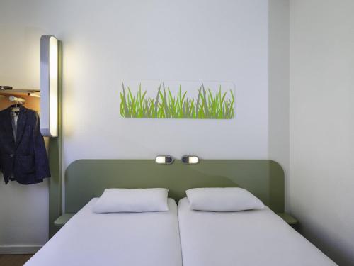 Habitación Doble - 2 camas del hotel Ibis Budget Málaga Centro. Foto 2