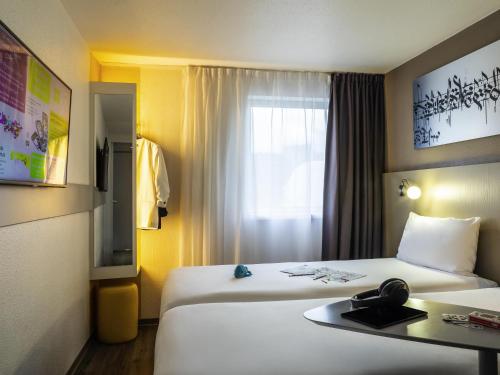Habitación Twin Estándar del hotel Ibis Styles Paris Bercy. Foto 7