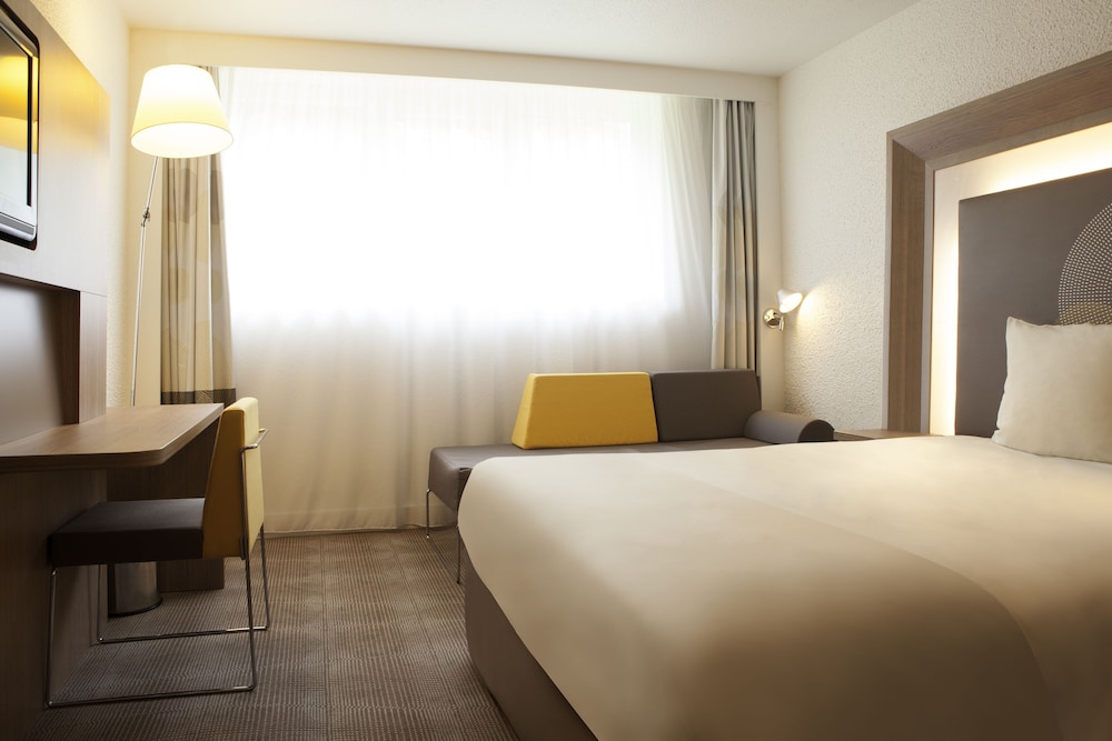 Habitación familiar ejecutiva con cama doble y sofá - cama doble del hotel Novotel Paris Pont De Sevres. Foto 1
