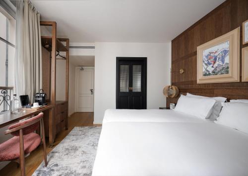 Habitación The Signature del hotel Pulitzer Paris. Foto 1