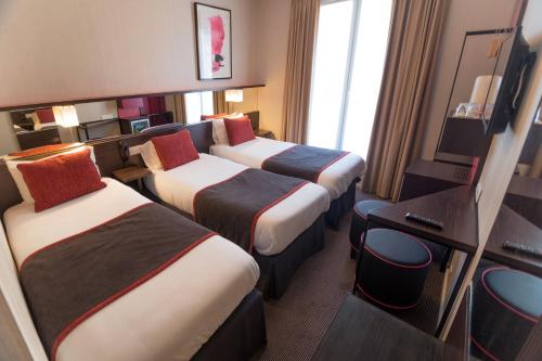 Habitación Triple del hotel Charing Cross. Foto 1