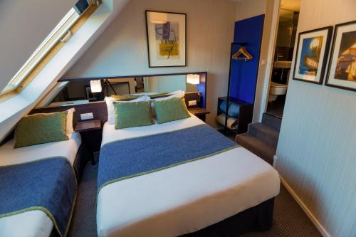 Habitación Triple del hotel Charing Cross. Foto 5