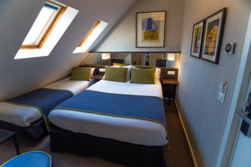 Habitación Triple del hotel Charing Cross. Foto 13