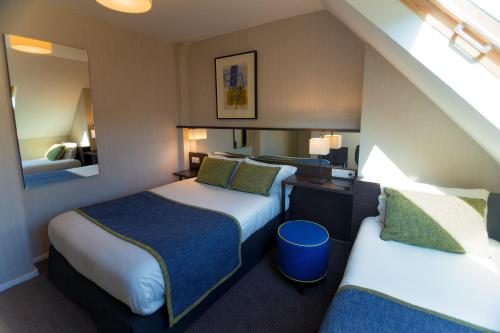 Habitación Triple del hotel Charing Cross. Foto 14