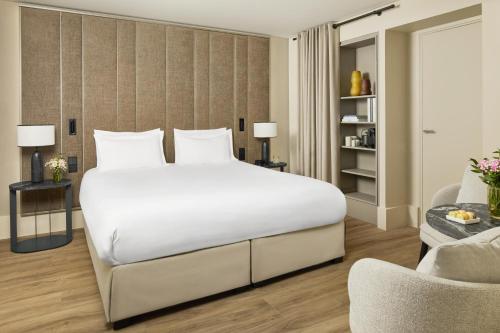 Suite con cama supletoria del hotel NH Paris Opéra Faubourg