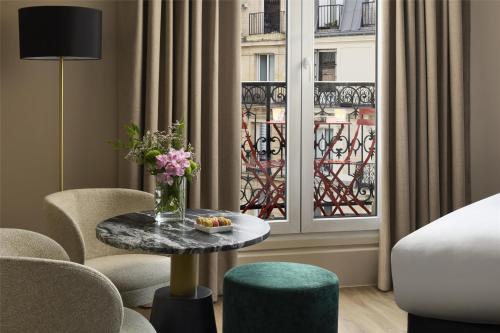 Suite Junior del hotel NH Paris Opéra Faubourg. Foto 1