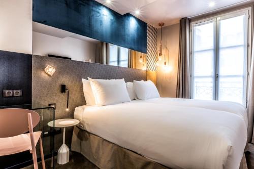 Habitación Doble - 2 camas del hotel Duette Paris. Foto 4