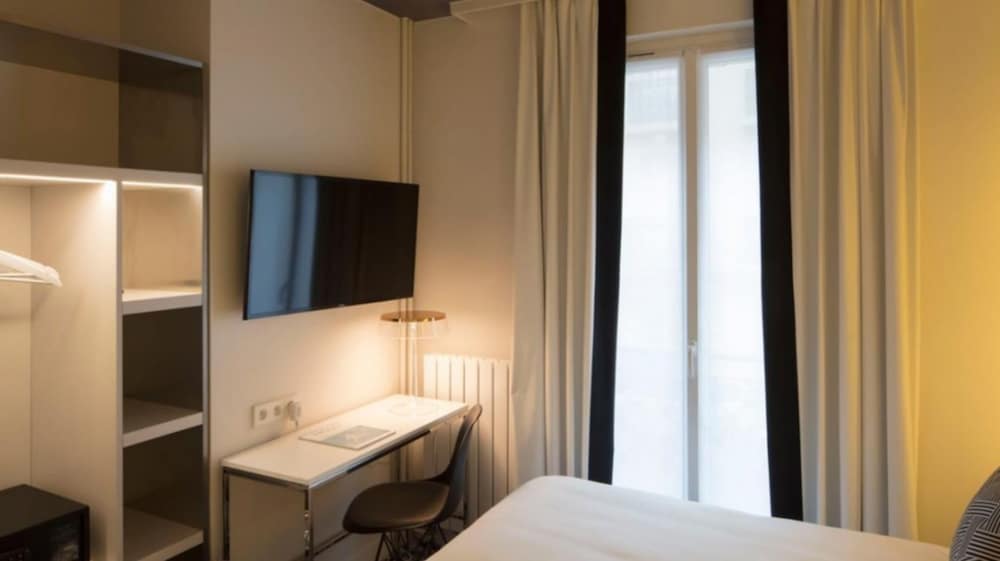 Habitación familiar, habitaciones comunicadas del hotel Nouvel Eiffel. Foto 3