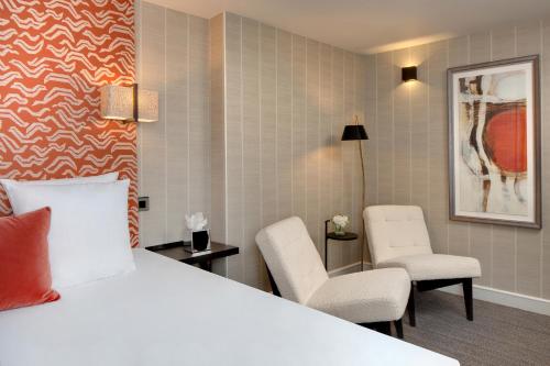 Habitación Deluxe del hotel Le Senat. Foto 2