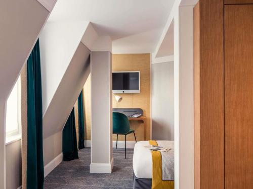 Habitación Individual Clásica del hotel Mercure Paris Opéra Garnier. Foto 4