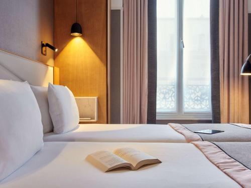 Habitación Doble Clásica - 2 camas del hotel Mercure Paris Opéra Garnier. Foto 4