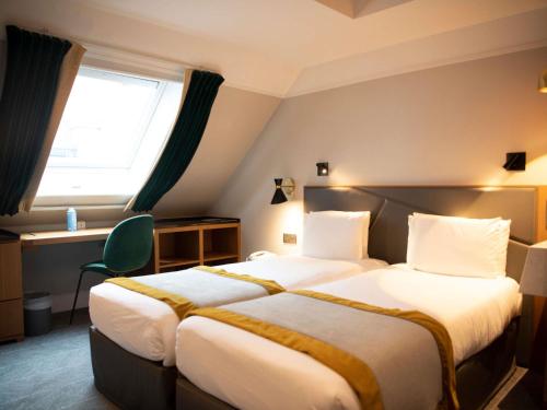 Habitación Doble Clásica - 2 camas del hotel Mercure Paris Opéra Garnier. Foto 10