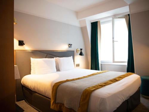 Habitación Doble Clásica del hotel Mercure Paris Opéra Garnier. Foto 12