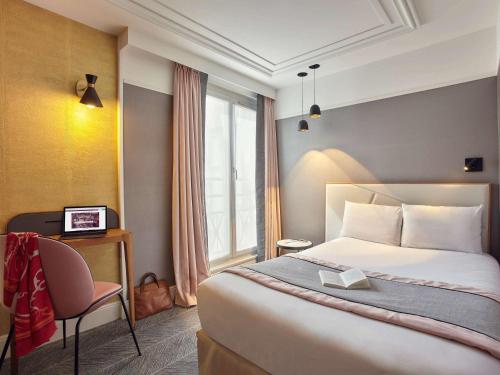 Habitación Individual Clásica del hotel Mercure Paris Opéra Garnier. Foto 2