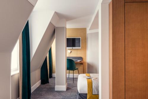 Habitación Individual Clásica del hotel Mercure Paris Opéra Garnier. Foto 6