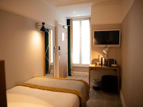 Habitación Individual Clásica del hotel Mercure Paris Opéra Garnier. Foto 8