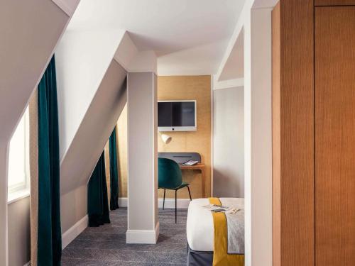 Habitación Individual Clásica del hotel Mercure Paris Opéra Garnier. Foto 9