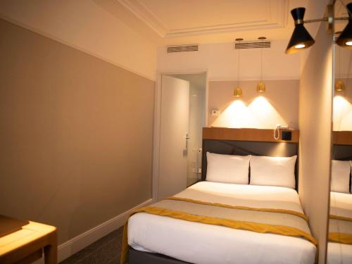 Habitación Individual Clásica del hotel Mercure Paris Opéra Garnier. Foto 10