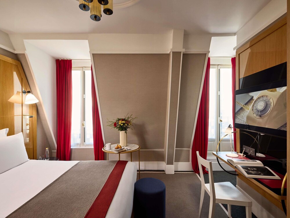 Habitación clásica, 1 cama de matrimonio del hotel L'echiquier Opéra Paris Mgallery Collection. Foto 2