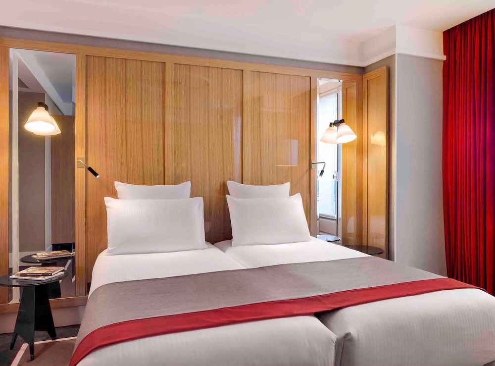 Habitación Deluxe, 1 cama doble o 2 individuales del hotel L'echiquier Opéra Paris Mgallery Collection. Foto 1