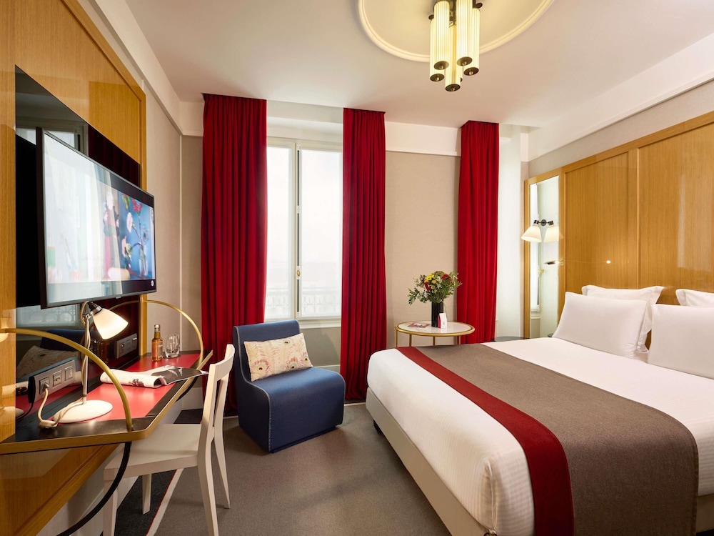 Habitación clásica, 1 cama de matrimonio del hotel L'echiquier Opéra Paris Mgallery Collection. Foto 12