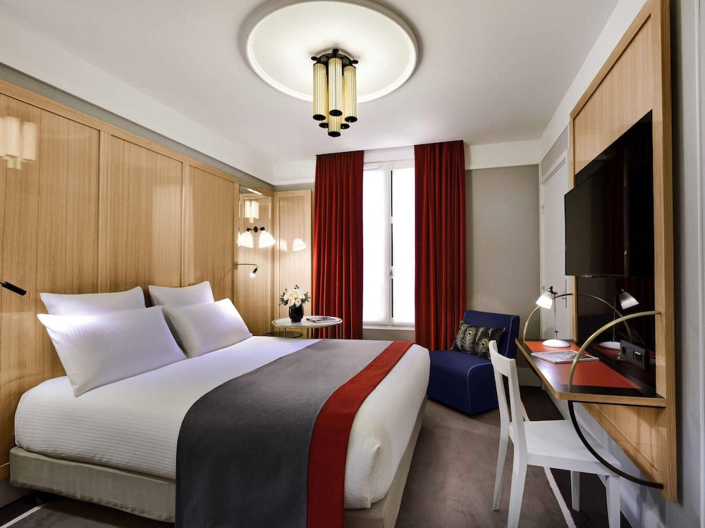 Habitación clásica, 1 cama de matrimonio del hotel L'echiquier Opéra Paris Mgallery Collection. Foto 16