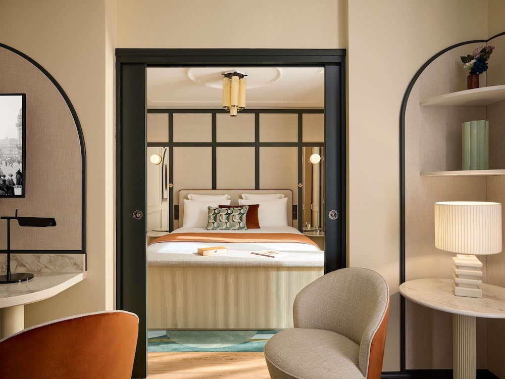 Suite Deluxe, 1 cama de matrimonio grande, 2 baños del hotel L'echiquier Opéra Paris Mgallery Collection